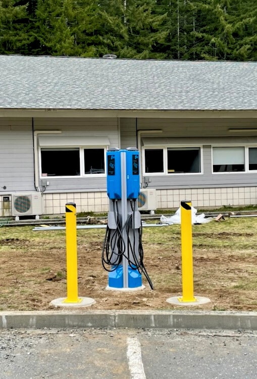 EV Charger for indigenous tribe by EVOLVsolar in British Columbia. Electrical Vehicle Power Charging Station in remote First Nation community land.